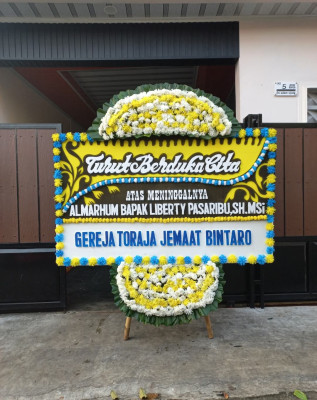 Papan Bunga Duka di Gebang Raya